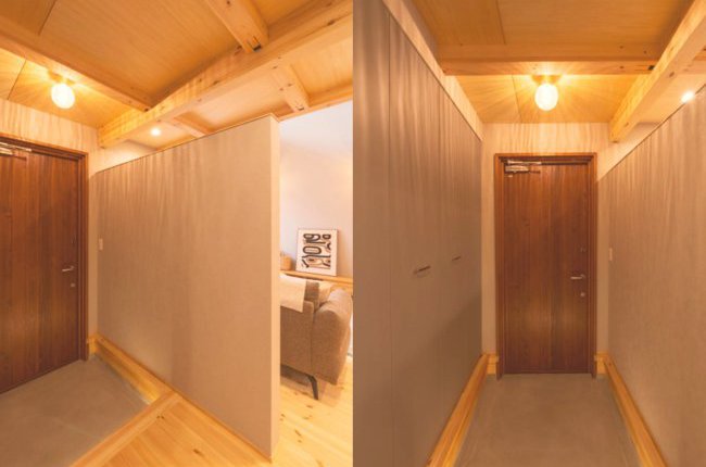 『落ち着きのある玄関』
玄関スペースにもこだわりのグレー要素を散りばめています!ドアは木製ドア。リビングと玄関を分ける間仕切りが三和土の色味とマッチして落ち着きのある空間になっております。