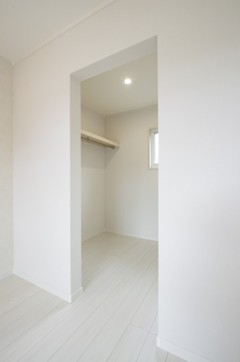 大きなホールとウォークインクローゼットがある2階