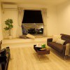 【3階セカンドリビング】シアタールームは落ち着いたカラーの家具で。