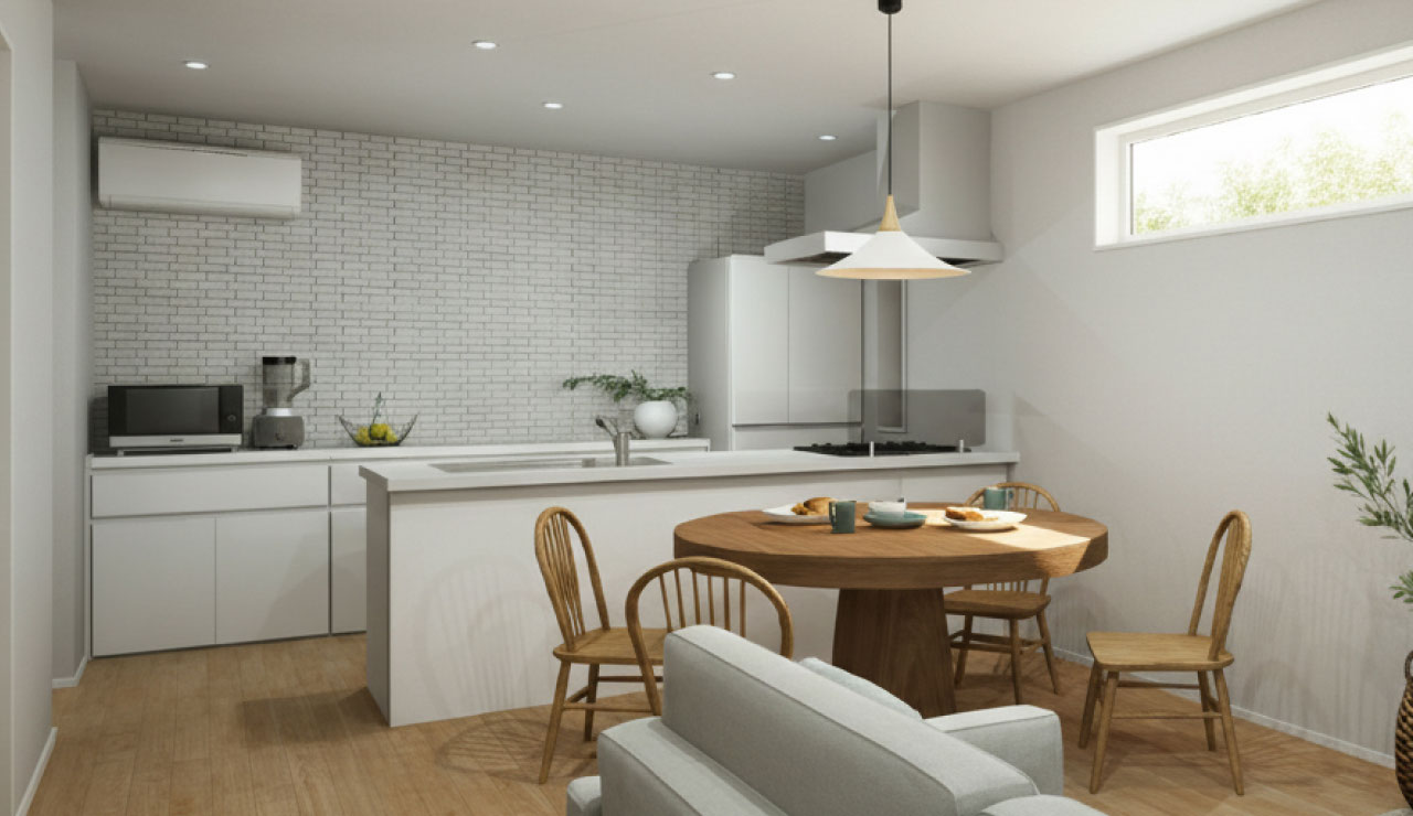 白を基調とした対面キッチンと明るいダイニング